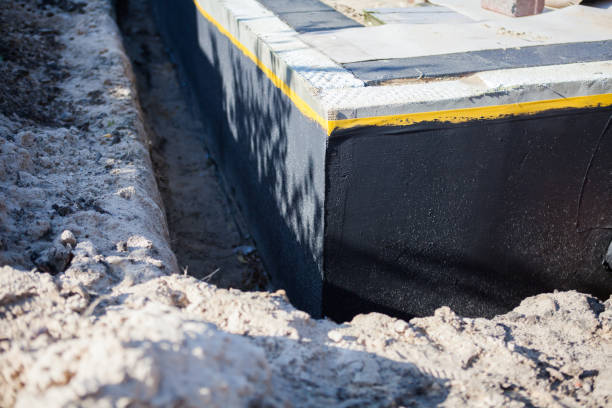 Professional Waterproofing technician working in West Linn, OR